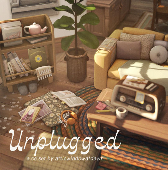 an unplugged living room is shown with furniture and books on the floor