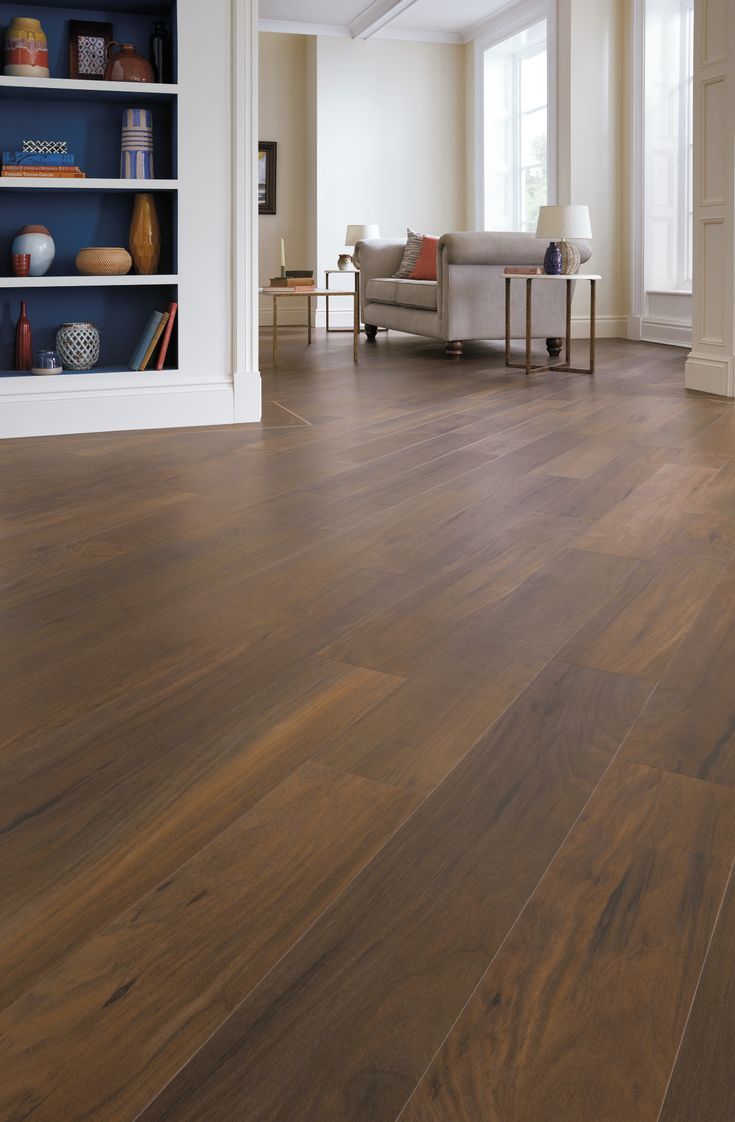 Natural Walnut LVP flooring shown in an entryway/foyer with a traditional living room visible in the background, followed by a close-up angled image. Walnut Luxury Vinyl Plank Flooring, Wide Plank Walnut Floors, Natural Walnut Floors, Chocolate Brown Flooring, Walnut Vinyl Plank Flooring, Frogtown Valley Walnut Flooring, Walnut Lvp Floors, Walnut Floors Kitchen, Sierra Flooring