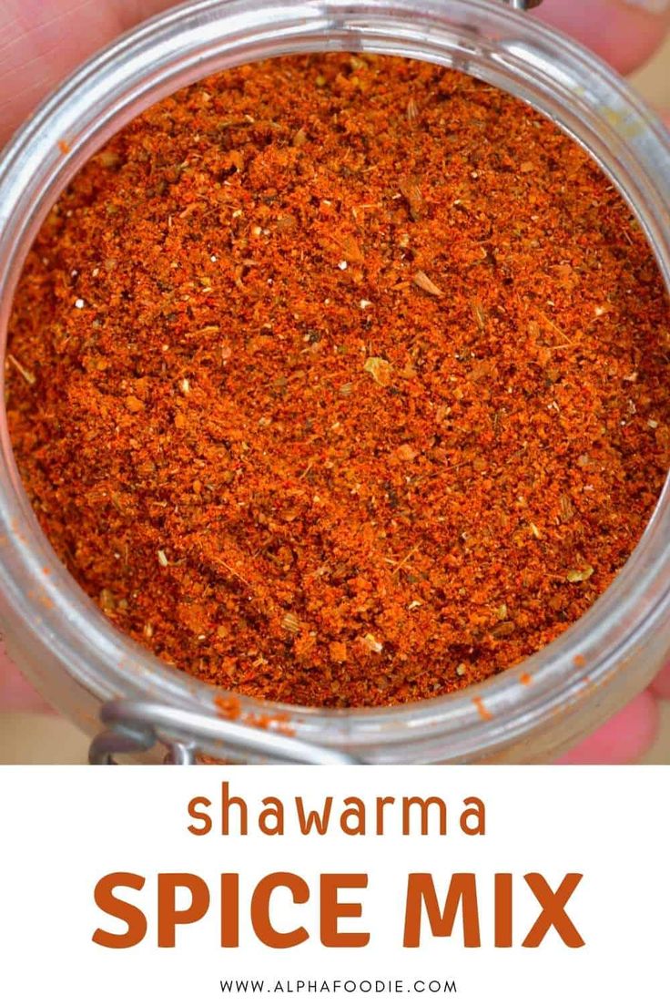 someone is holding up a jar of spice mix with the words, shawarma spice mix