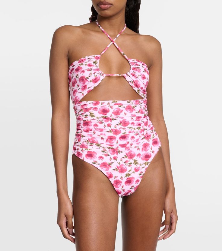 Floral halterneck swimsuit in pink - Magda Butrym | Mytheresa Ruched Triangle Top Swimwear In Nylon, Spring Nylon Tankini For Poolside, Elastane Halter Neck Tankini For Beach, Nylon Tankini For Spring Sunbathing, Spring Nylon Tankini For Sunbathing, Elastane Tankini With Adjustable Straps For Beach, Nylon Tankini For Sunbathing In Spring, Pink Nylon Tankini For Vacation, Spring Ruched Backless Swimwear