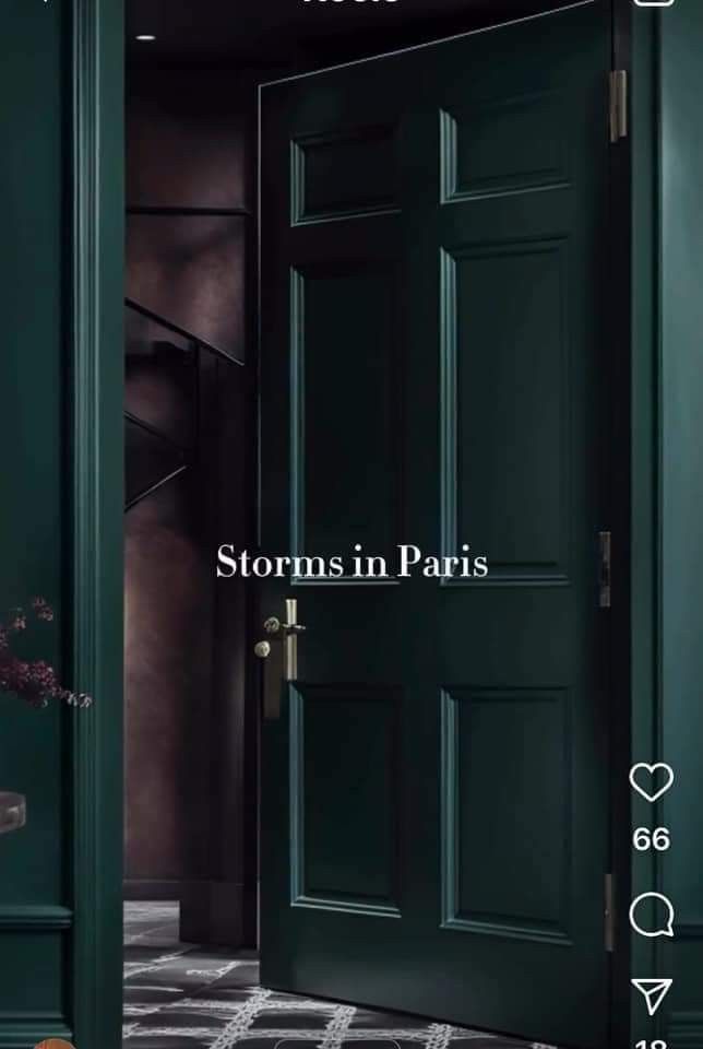 a green door with the words storm in paris on it and an image of a hallway