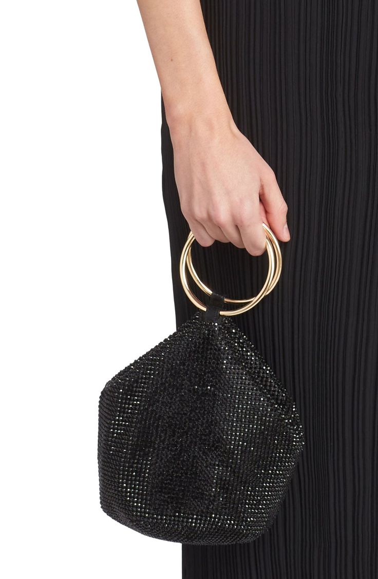 Crystal-studded construction adds a dreamy sheen to this slouchy bag with polished metal bangle handles you can slide up over your wrist to go hands-free. Top zip closure Top carry handles Logo-jacquard lining Aluminum/glass Imported Evening Top Handle Bag With Metal Hardware, Top Handle Evening Bag With Metal Hardware, Chic Clutch With Detachable Round Handle, Evening Clutch With Metal Hardware, Clutch Evening Bag With Metal Hardware, Top Handle Clutch For Evening, Evening Clutch With Top Handle, Chic Evening Clutch With Round Handle, Evening Bag With Removable Pouch And Round Handle