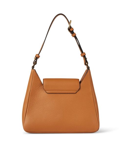 The Multrees hobo is a casual chic and functional silhouette, perfect for everyday wear. Designed with practicality and versatility in mind, this slouchy shoulder bag comes with an additional leather strap, turning into an effortlessly cool crossbody. Wear yours with your favorite seasonal separates to add instant polish to any ensemble. Chic Hobo Bag With Gold-tone Hardware For On-the-go, Versatile Hobo Shoulder Bag With Gold-tone Hardware, Versatile Hobo Bag With Gold-tone Hardware, Soft Leather Crossbody Hobo Bag For Work, Leather Hobo Bag With Gold-tone Hardware For On-the-go, Versatile Hobo Bag With Gold-tone Hardware For Work, Versatile Leather Hobo Bag With Gold-tone Hardware, Chic Hobo Bag With Adjustable Strap For Work, Versatile Shoulder Bag With Gold-tone Hardware