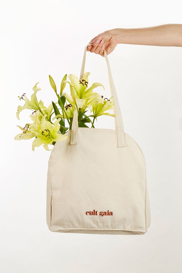 REUSABLE TOTE - NATURAL – CULT GAIA Eco-friendly Cotton Bags For Spring, Eco-friendly Cotton Tote Beach Bag, Large Capacity Cotton Tote Beach Bag, Cotton Beach Bag With Double Handle For Daily Use, Eco-friendly Cotton Travel Bag, Spring Everyday Tote Canvas Bag, Spring Everyday Canvas Tote Bag, Eco-friendly Summer Bag With Canvas Lining, Cotton Bags For Everyday Summer Use