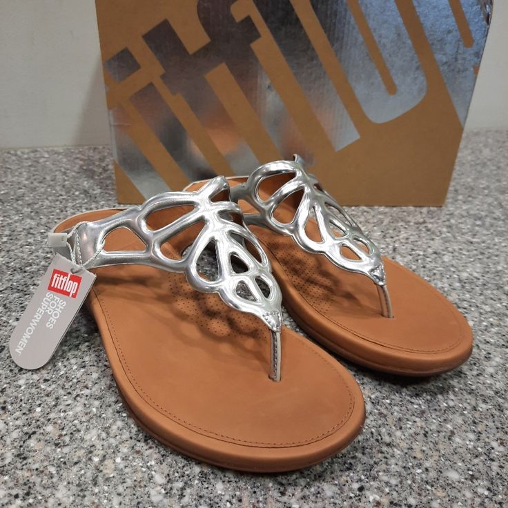 Nwt Fitflop Bunble Toe Post Sandals In Metallic Silver. Some Transfer Of Mettalic Coating As Shown In Picture Four. Ships In Original Packaging With Dust Bag. Silver Sandals With Single Toe Strap In Synthetic, Silver Cushioned Slip-on Sandals, Silver Sandals With Textured Footbed, Silver Round Toe Synthetic Sandals, Silver Beach Sandals With Cushioned Footbed, Silver Open Toe Synthetic Flip Flops, Silver Toe Post Flip Flops For Spring, Silver Synthetic Open Toe Flip Flops, Silver Flat Flip Flops For Beach