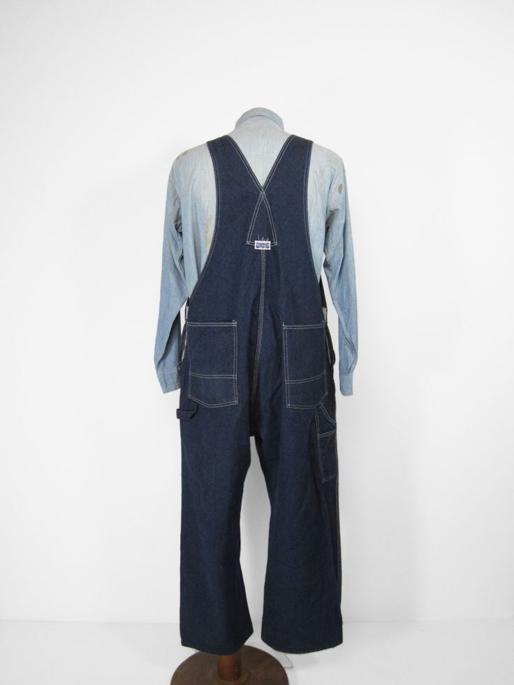 "Vintage Big Smith Overalls Denim Work Bibs Made in USA Workwear - Size 42 These dark blue overalls were American made and feature double pencil slots, tool pockets, and a button fly. Condition is excellent with only some dark spots on one knee and a few other places. Label size 42 x 30 but they may have been hemmed shorter. Please compare the measurements below to your favorite overalls or jeans, laid flat, before purchasing. Waist: 21\" Hip: 26\" Inseam: 26\" Cuff: 10\" See more vintage items: