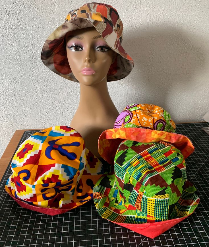 Unique and Handmade reversible bucket hats Casual Multicolor Cloche Hat With Wide Brim, Casual Multicolor Wide Brim Cloche Hat, Casual Multicolor Wide Brim Mini Hat, Casual Wide Brim Multicolor Mini Hats, Multicolor Bucket Hat With Short Brim, Brown Reversible Bucket Hat With Curved Brim, Casual Mini Bucket Hat For Festivals, Reversible Bucket Hat For Beach, Reversible Wide Brim Bucket Hat For Festivals