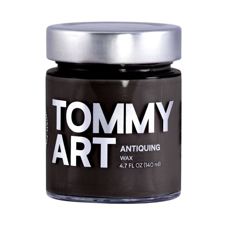 a jar of tommy art wax on a white background