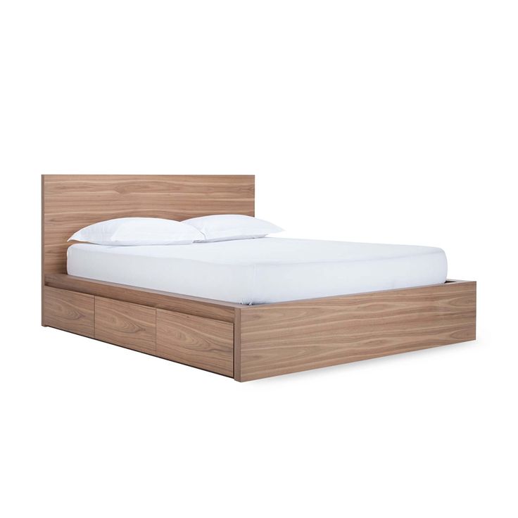 the bed is made and has two drawers on each side, along with white sheets