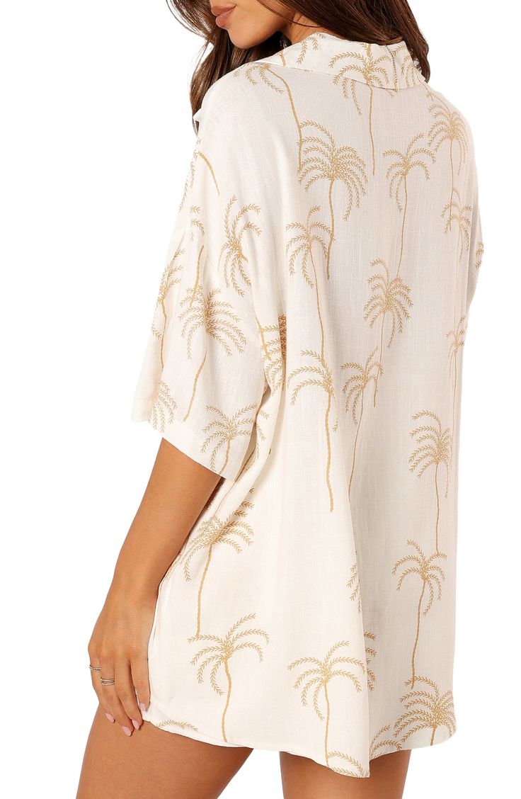 Vacation is calling in this breezy linen-kissed shirt designed with neutral palms and dropped shoulders. Front button closure Notched collar Elbow-length sleeves 70% rayon, 30% linen Hand wash, dry flat Imported Summer Long Sleeve Tops With Palm Tree Print, Long Sleeve Tops With Palm Tree Print For Summer, Beach Rayon Tops With Relaxed Fit, White Linen Beachwear Tops, Linen Beachwear Tops For Summer, Linen Tops For Summer Beachwear, Relaxed Fit Rayon Beach Tops, Relaxed Fit Rayon Tops For Beach, Beach Rayon Blouse Relaxed Fit