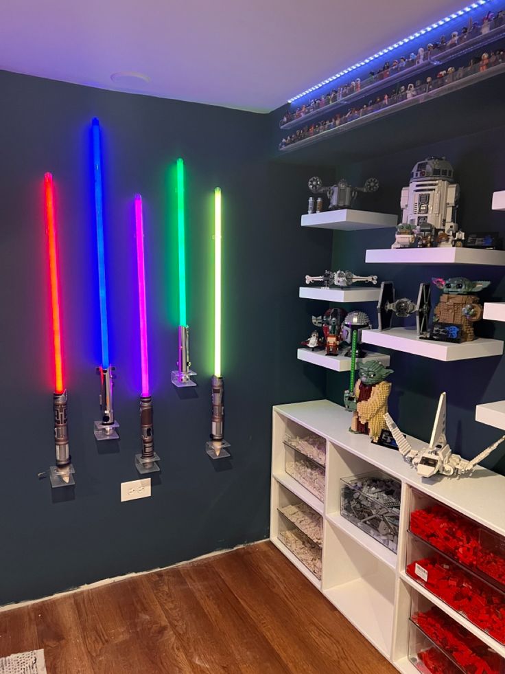 three lightsabes are lit up in the room