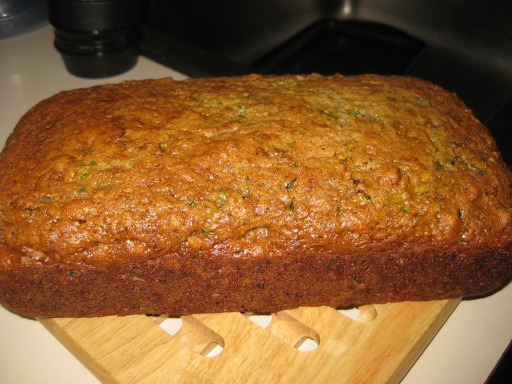 a loaf of bread sitting on top of a cutting board