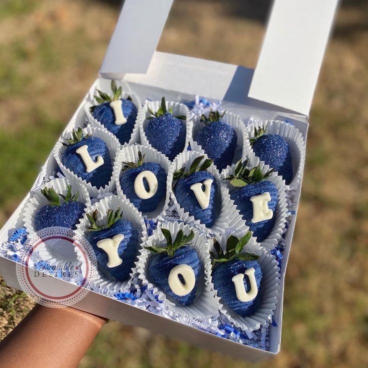 strawberries are arranged in the shape of letters and numbers on top of each other