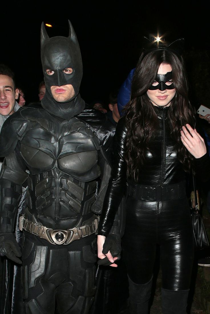 the actors dressed as batman and catwoman are seen at an event on november 22, 2013