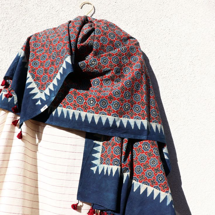 A supremely versatile accessory, wear the dupatta draped around your shoulders, or wrapped around your hip like a sarong, or as a headwrap like a turban. A touch of magic any day. ______ Traditional Ajrakh hand block-printed dupatta scarf from Kutch, Gujarat. 35" x 96" fairtrade organic cotton textile, hand-printed using heritage techniques, native to the Sindh region. 100% chemical-free and biodegradable, block-printed using natural extract dyes such as indigo, madder, jaggery, and iron acetate Traditional Kalamkari Print Dupatta For Festival, Traditional Drape Cotton Saree For Festival, Bohemian Shawl With Traditional Drape For Festive Occasions, Traditional Cotton Saree For Festivals, Bohemian Pashmina Shawl With Traditional Patterns, Festive Bohemian Scarf With Traditional Drape, Bohemian Pashmina Saree With Traditional Drape, Bohemian Cotton Shawl With Traditional Patterns, Bohemian Handloom Dupatta With Traditional Drape