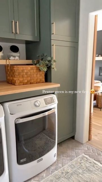 a washer and dryer in a small kitchen