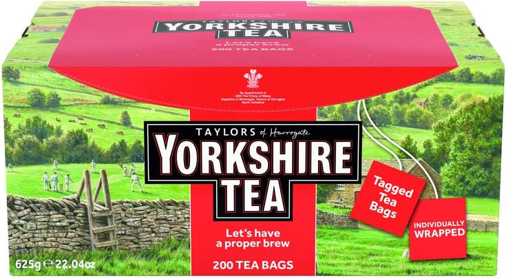 yorkshire tea in a red box with the words yorkshire tea written on it and two pieces of paper cut out