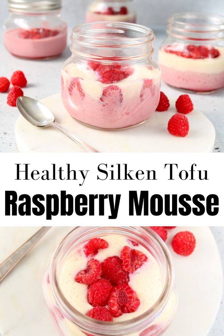 raspberry mousse with yogurt and strawberries in a jar