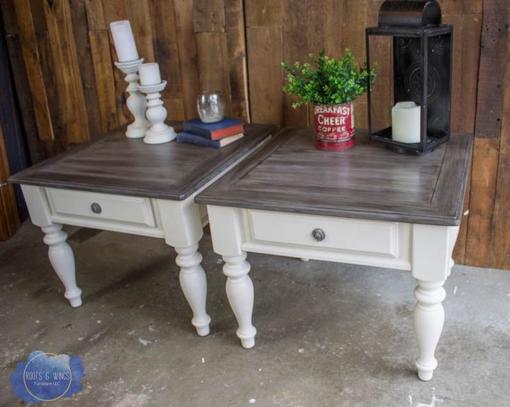 two white tables sitting next to each other