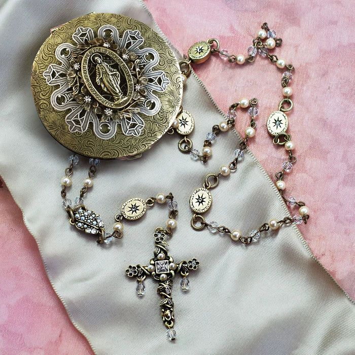 The rosary is thought to have originated in the year 1208. The cross, as a symbol of Christendom, is loved as a spiritual, protective and ornamental emblem throughout the entire world. Not so long ago, one could browse the stalls of French antique markets and come upon desirable little objects that had been loved through several generations of owners. Some believe that each owner has imparted a bit of their personal spirit and history that makes pondering such objects all the more compelling. Th Vintage Rosary, The Rosary, Rosary Necklace, Antique Market, French Antique, Swarovski Pearls, Our Lady, The Cross, Keepsake Boxes