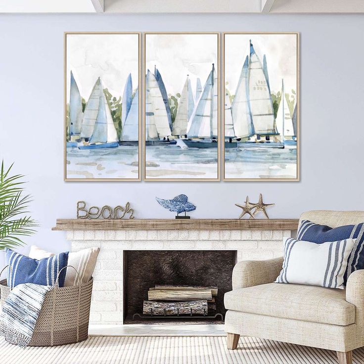 three sailboats on the water in front of a fireplace with blue and white pillows