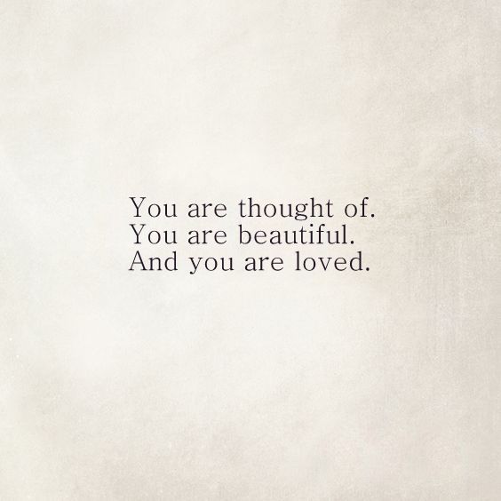 a white wall with a quote on it that says, you are thought of you are beautiful and you are loved