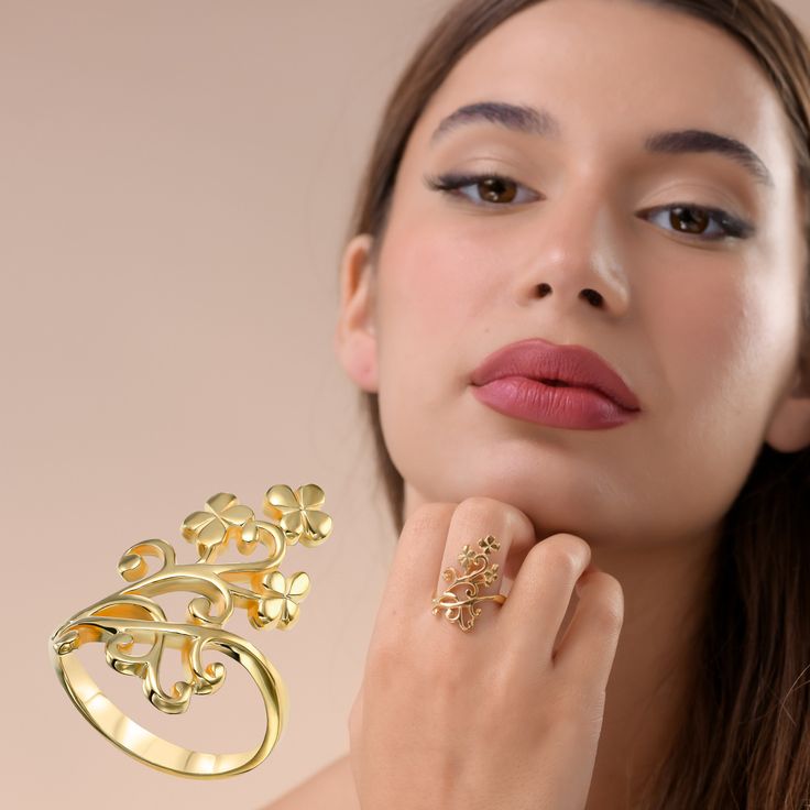 This exquisite 14 Gold Plated Silver floral Ring for Women is a stunning piece that effortlessly combines elegance and sophistication. Crafted with meticulous attention to detail, this ring showcases a beautiful blend of silver and gold, creating a captivating contrast that will instantly catch the eye. The gold adds a touch of luxury and brilliance to the overall design, making it the perfect accessory for any occasion. Designed especially for women, this ring features a sleek and feminine silh Elegant Gold Flower Ring, Elegant Flower Ring For Formal Occasions, Elegant Yellow Gold Flower Ring For Wedding, Elegant Flower-shaped Promise Ring, Elegant Yellow Gold Wedding Flower Ring, Elegant Gold-plated Flower Ring, Elegant Gold Plated Flower Ring For Wedding, Elegant Gold Flower Ring For Wedding, Gold Elegant Flower Ring For Promise