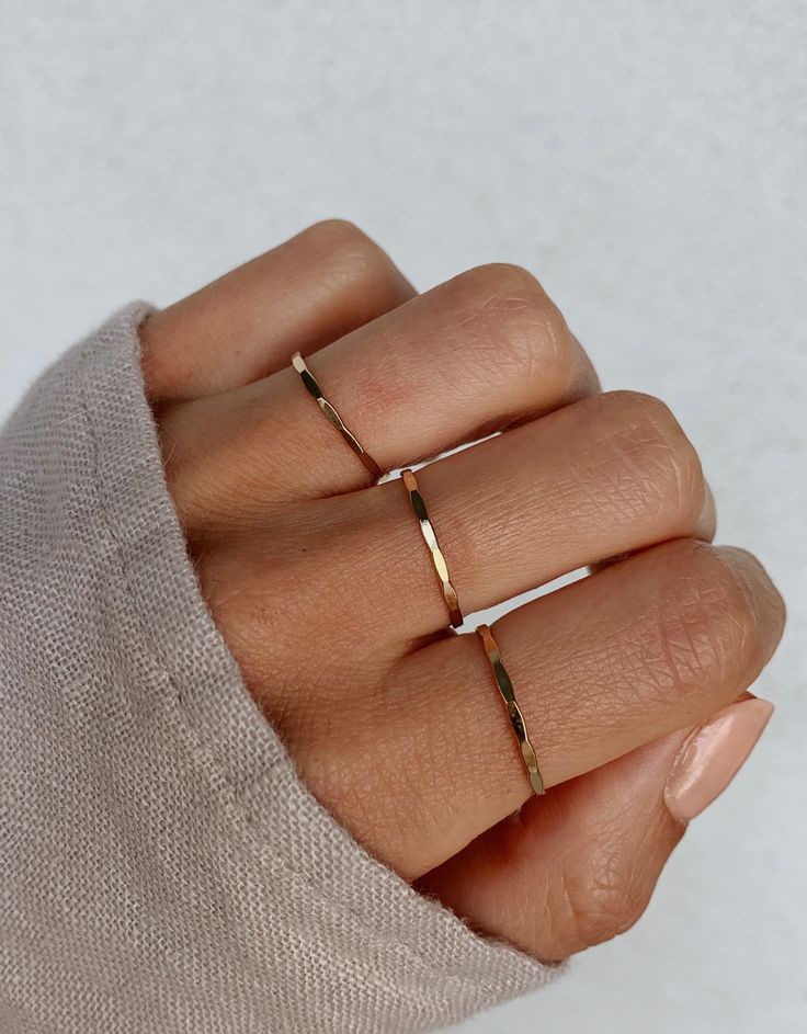 These rings are perfect for layering, wearing alone, or adding to a ring you already have. They are extremely strong. This is the price for one ring, if you want to order a stack, view our other listing with multiple rings discounted. Sleep in them, shower in them, LIVE in them! Simple Tarnish Resistant Midi Rings For Everyday, Simple Tarnish-resistant Midi Rings For Everyday, Simple Everyday Tarnish Resistant Midi Rings, Adjustable Everyday Rings With Round Band, Dainty Adjustable Stackable Rings For Everyday, Everyday Stackable Rings With A Simple Design, Everyday Stackable Midi Rings With Open Ring Shape, Simple Stackable Open Ring Jewelry, Adjustable Dainty Stackable Rings For Everyday