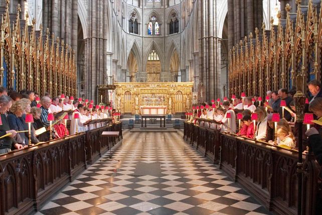 a group of people standing in front of a church altar with musical instruments on it