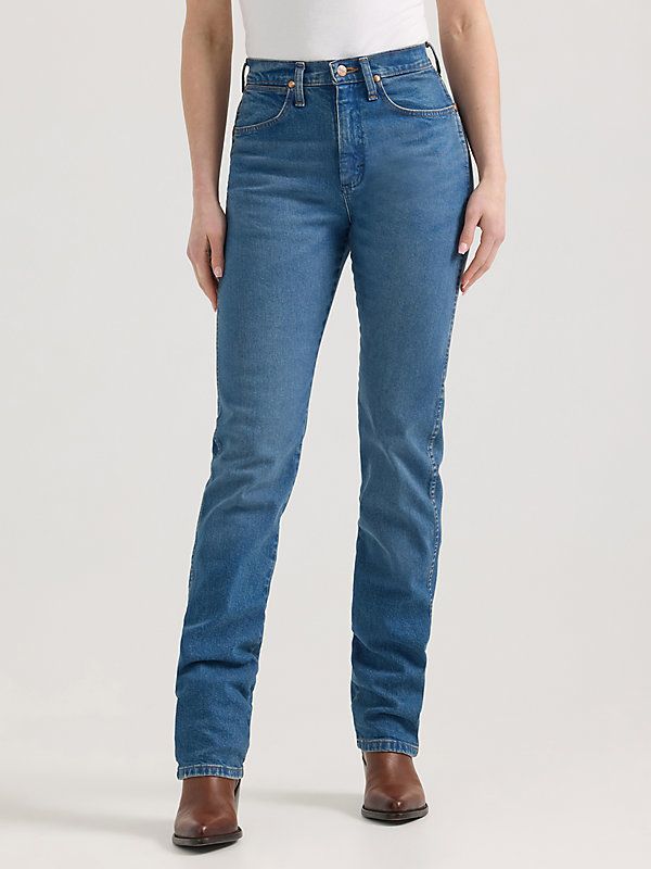 Our 14MWZ has always been a favorite for a reason. This latest rendition with premium denim washes doubles down on the sorcery, with a vintage-inspired fit featuring a super high-rise silhouette that sits at your natural waist, a slim fit through the thigh, and a tapered leg that fits perfectly over cowgirl boots. It’s crafted from premium cotton with just a hint of stretch to keep you comfortable no matter what the day throws your way. These bootcut jeans for women also come with all the iconic Medium Wash Jeans With Five Pockets For Rodeo, Medium Wash Denim Bottoms For Rodeo, Classic Fitted Washed Blue Jeans, Light Wash Denim Jeans For Rodeo, Cotton Jeans With Five Pockets For Rodeo, Casual Medium Wash Jeans For Rodeo, Light Wash Fitted Jeans, High Rise Cotton Jeans For Rodeo, Classic Fitted Washed Jeans