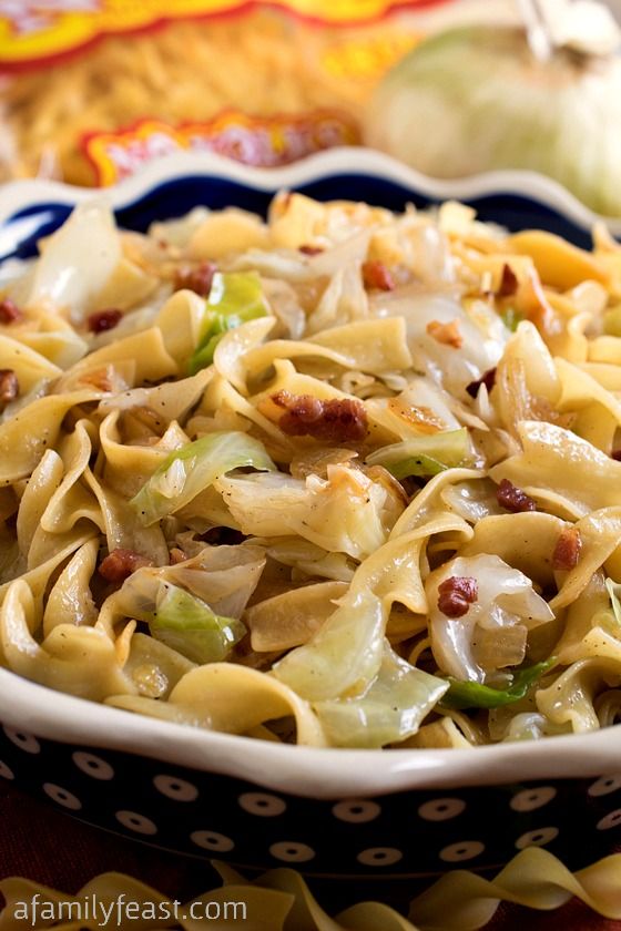 pasta with bacon, cabbage and other toppings on a plate