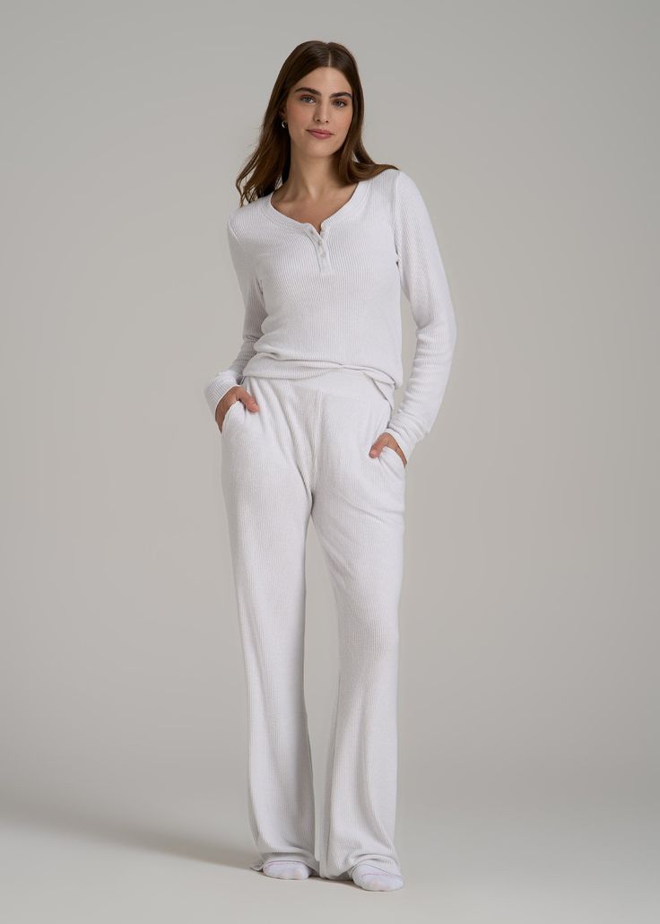 About Our Ribbed Flare Extra-Long Lounge Pants Say hello to the loungewear, made just for you. Our Ribbed Flare Extra-Long Lounge Pants are the cozy pair you’ll want to wear everywhere. Made with a soft ribbed knit, the casual pants are perfect for weekends away or peaceful staycations. We designed these women’s tall lounge pants just for ladies from 5’9 to 6’6, so you can trust us when we say they’re full length. We’ve also ensured the tri-blend fabric has been pre-washed and shrinkage controll Hospital Pajamas For Mom, Soft Texture Bottoms For Loungewear, Soft Loungewear Bottoms, Soft Texture Long Pants For Loungewear, Comfy Sleep Pants, Wide Leg Ribbed Loungewear Pants, Cozy Bottoms For Relaxation, Solid Color Harem Loungewear Pants, Comfortable Straight Loungewear Pants