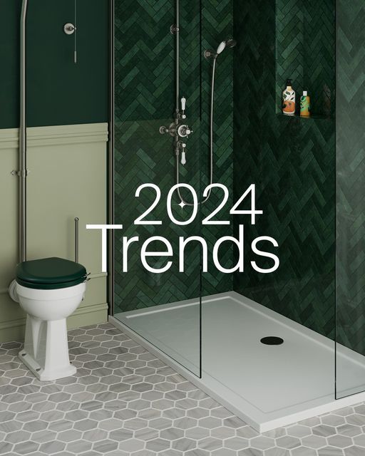 a bathroom with green walls and tile flooring next to a white toilet in the corner