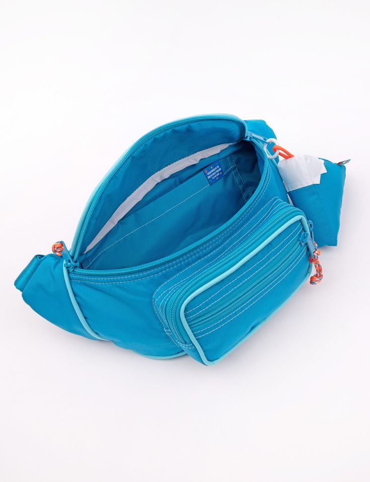 Our Fanny Sling is the cross body bag you've been waiting for! This silhouette hugs your body in all the right places and is the perfect medium size that will hold your necessities without weighing you down. Features super soft match nylon webbing, tonal piping details, match buckle, a padded exterior for extra comfort and insulation, 3 separate zipper compartments, and two additional pockets in the main compartment. Coordinating paracord pulls make opening this bag a cinch! Comes with a matchin Functional Nylon Shoulder Bag With Water Bottle Pocket, Blue Nylon Belt Bag For Everyday Use, Functional Blue Nylon Belt Bag, Functional Nylon Belt Bag With Adjustable Strap, Functional Nylon Belt Bag, Nylon Crossbody Belt Bag For Outdoor Activities, Nylon Crossbody Belt Bag For Outdoor, Outdoor Nylon Crossbody Belt Bag, Functional Nylon Belt Bag For Commuting