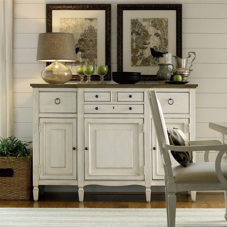 DETAILS Make entertaining friends and family a little easier with the Summer Hill Serving Buffet, featuring five drawers and lower storage for plates, tableware, and bottle storage. Driftwood finish top Five drawers Three doors Shelves Optional Bar Hutch available Cotton finish FINISH Cotton SIZE 61W X 21D X 42H France and Son is an authorized seller of this product. Dining Room Buffet Decor Ideas, Buffet Decor Ideas, Dining Room Buffet Decor, Serving Buffet, Buffet Furniture, Dining Room Server, Round Dining Room Sets, Driftwood Furniture, Server Cabinet