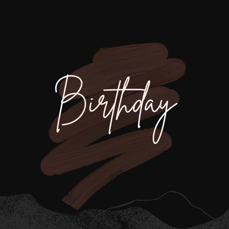 the words birthday written in white ink on a black background with brown and tan strokes