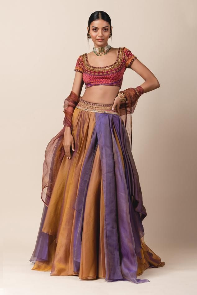 Multi-color organza draped lehenga paired with printed jersey blouse. Comes with sheer silk triangular scarf.
Component: 3
Embroidered, Printed
Neckline: U Neck
Sleeve Length: Cap
Fabric: Organza, Silk, Jersey
Color: Multi Color
Draped lehenga - Aza Fashions Draped Lehenga, Drape Lehenga, Brown Clothes, Lehenga Top, Orang India, Desi Fits, Punjabi Fashion, Printed Jersey, Indian Dresses Traditional