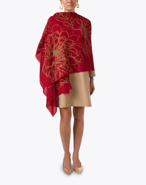 Janavi, a leading brand in unique and refined accessories, adds a stylish addition to its iconic collection. This scarf, cut from 100% wool, features a golden embroidered motif, offering a noteworthy artisanal look. Wrap this scarf around a light colored sheath dress for a feminine date night ensemble. Luxury Festive Shawl, Elegant Embroidered Scarves For Festive Occasions, Elegant Red Scarf For Festive Season, Luxury Pashmina Shawl For Formal Occasions, Elegant Red Festive Scarf, Elegant Red Embroidered Shawl, Elegant Cashmere Shawl, Elegant Embroidered Shawl For Fall, Elegant Embroidered Silk Shawl Scarf