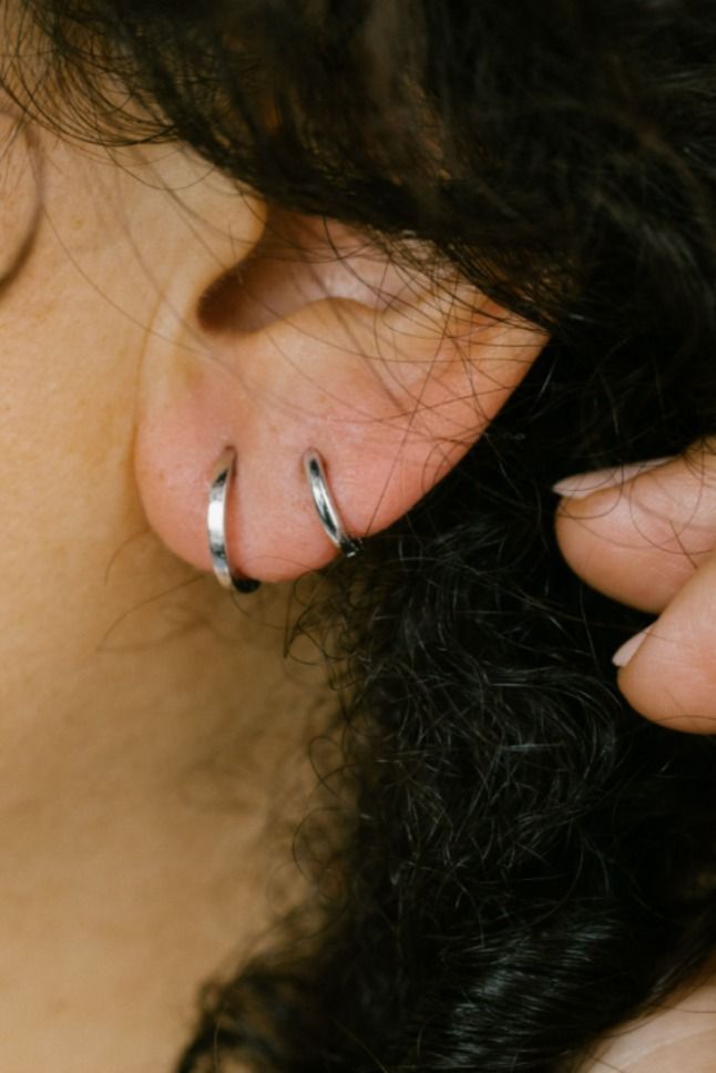 Solid gold huggie hoops similar to Yelena in Black Widows Style Baby Hoop Earrings, Black Widows, Double Piercing, Organic Cleaning Products, Mini Hoop Earrings, Recycled Metal, Non Stop, Solid Gold, Piercings