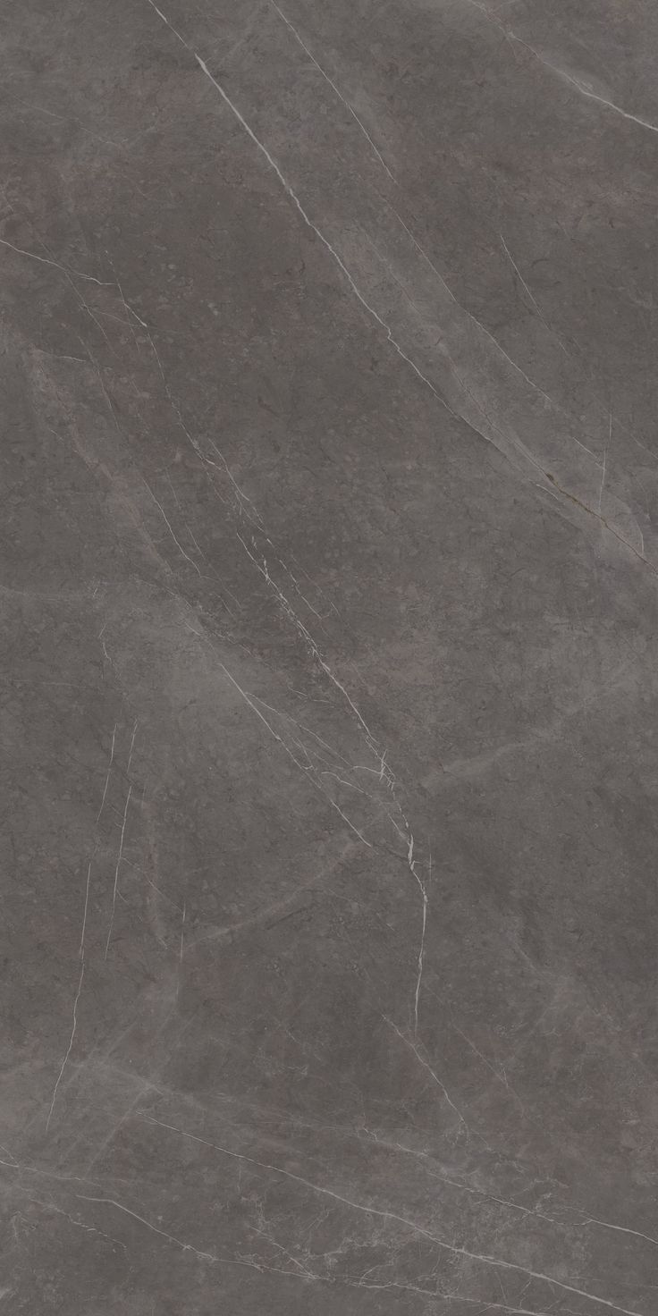 a gray marble textured wall and floor