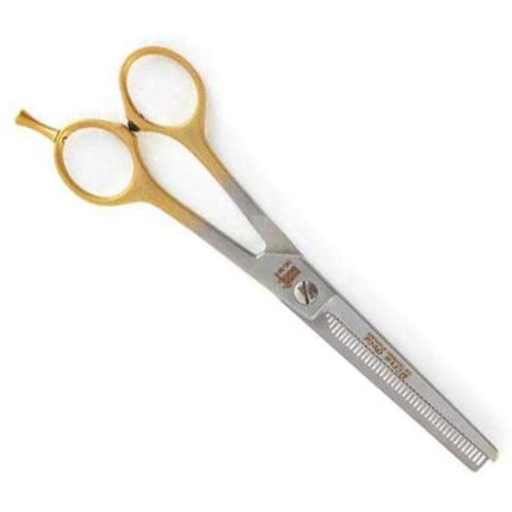 a pair of scissors sitting next to each other