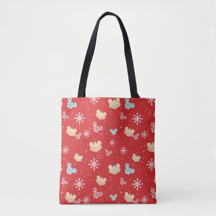 a red mickey mouse tote bag with snowflakes on it