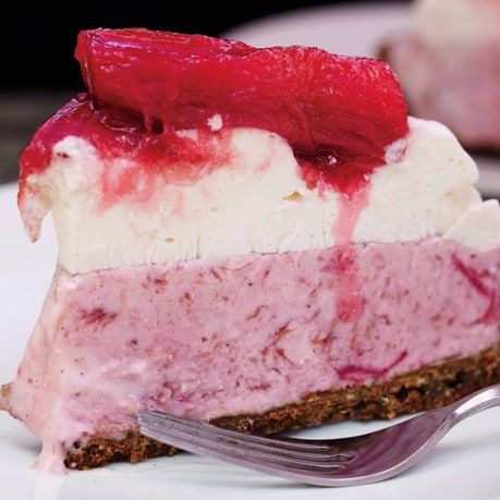 a piece of cheesecake on a plate with a fork