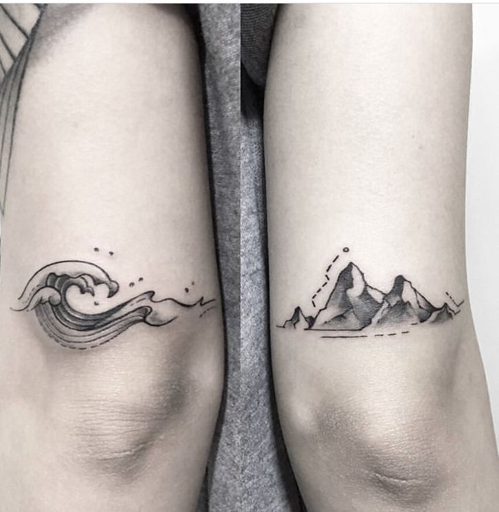 two tattoos with mountains and waves on their arms, one is black and white the other is grey