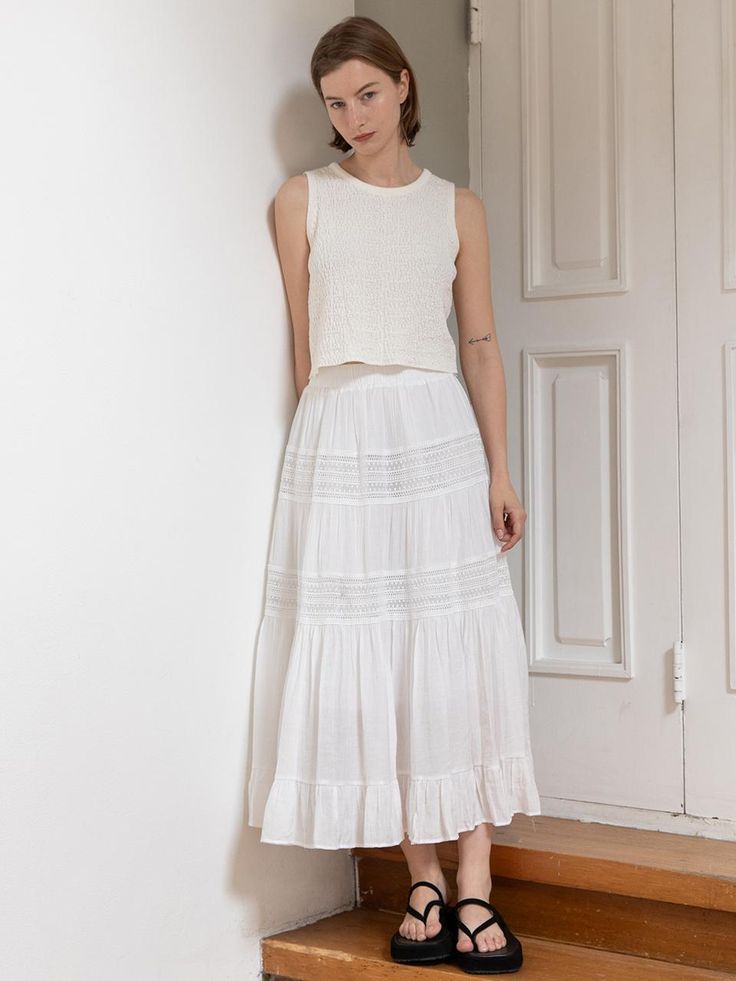 This is a feminine and unique skirt by JMARK New York that is made out of high quality and sturdy fabric. With trendy design detail and refined romantic mood, you can style it for your daily casual outfit.- Voluminous shirring detail- Feminine and unique mood- Elastic waistband and lace detail Feminine White Skirt With Ruffle Hem, Feminine White Maxi Skirt With Ruffles, Feminine White Ruffled Maxi Skirt, Fitted Gathered Maxi Skirt For Day Out, Feminine White Maxi Skirt For Day Out, White Feminine Tiered Maxi Skirt, Feminine White Maxi Skirt For Summer, Fitted Casual Maxi Skirt With Ruffle Hem, Feminine Gathered Maxi Skirt For Summer