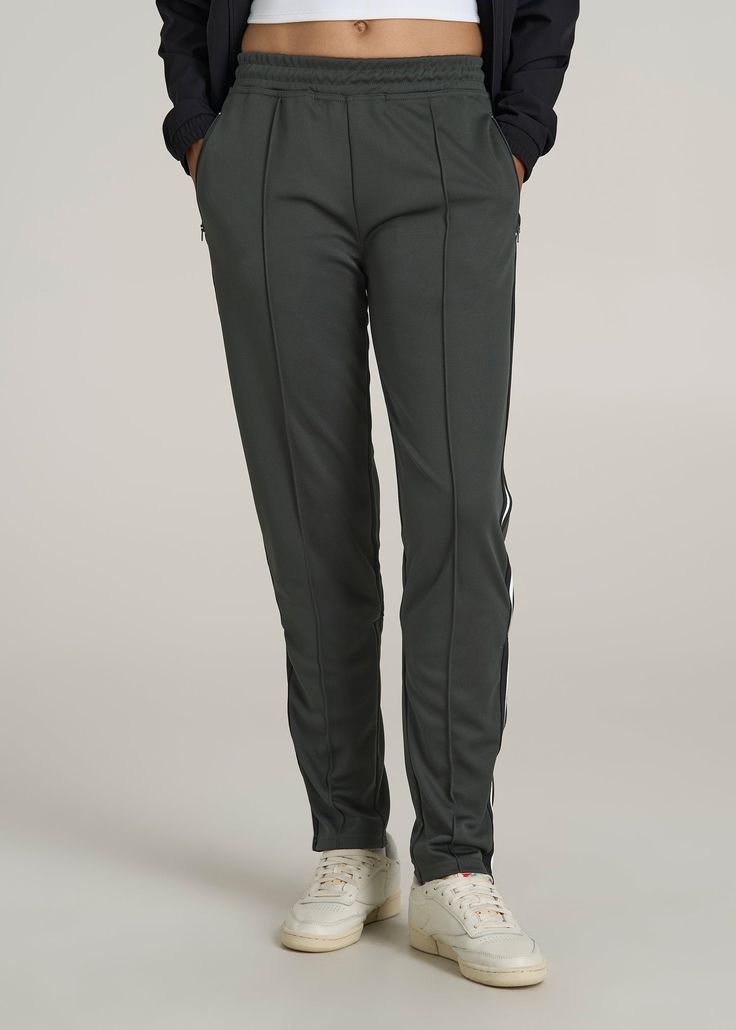 Get Sporty with Our Tall Women's Pants Redefining Tall Athletic Wear Elevate your athletic wear with our Athletic Stripe Pants for Tall Women. These pants seamlessly blend retro athletic vibes with modern fabric technology, offering both style and functionality. The zippered bottom and internal drawstring cater to a customizable fit, while the full-length design and regular fit ensure comfort for taller frames. The updated fabric adds a touch of nostalgia, making these women's tall pants a styli Pants For Tall Women, Scrubs Dress, Cozy Sleepwear, Stripe Pants, Tall Pants, Fabric Technology, Summer Lookbook, Sports Blazer, Long Sleeve Tee Shirts