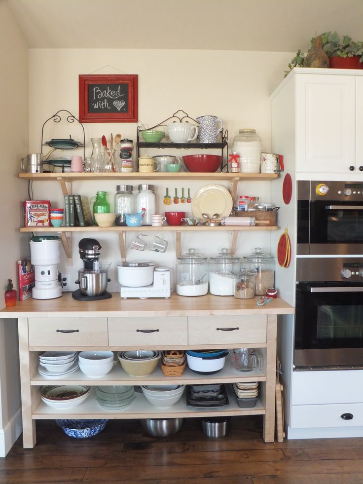 the kitchen is clean and ready to be used for cooking, baking, and eating