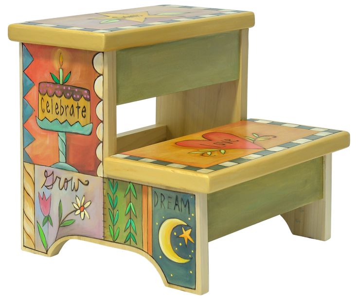 a child's wooden step stool painted with colorful images and words on the side