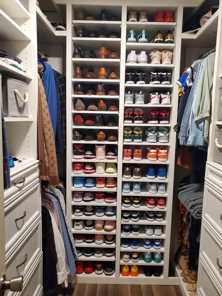 the closet is full of shoes and other items