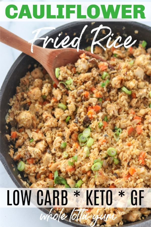 a skillet filled with fried rice and vegetables